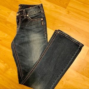 Bootcut jeans with rhinestone embellishments